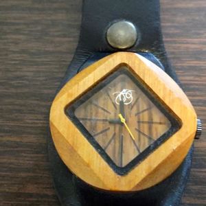 Wooden watch on leather strap